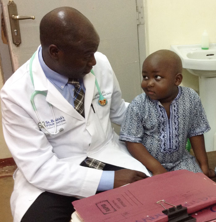 Dr. Lubega Uganda childhood cancer patient