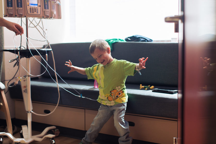 Micah dances alongside hospital monitors