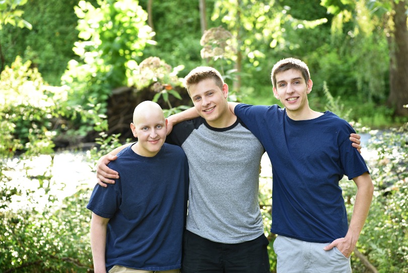 Zach with his brothers