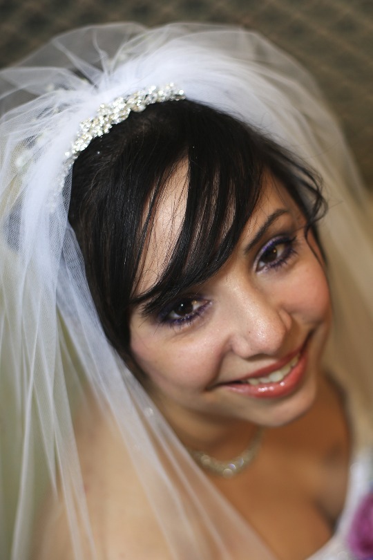 Brittany smiles during her wedding day